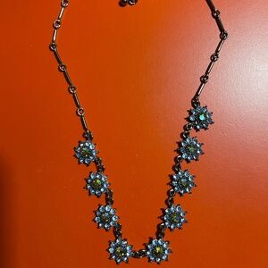 Blue rhinestone flower necklace.